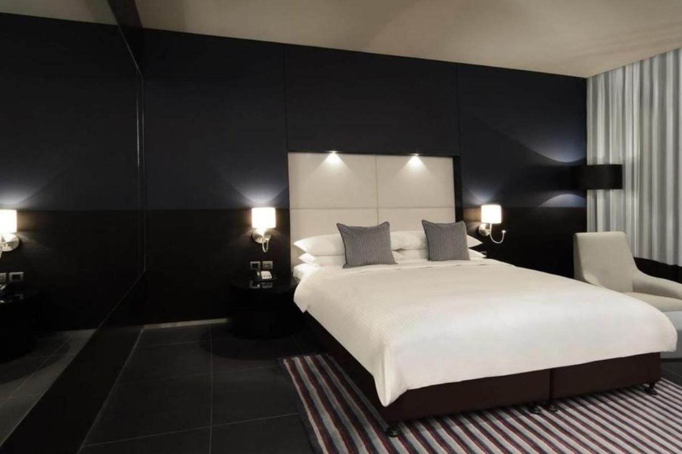 The Abdali Boulevard Hotel Amán Exterior foto A bedroom at the Mandarin Oriental, Munich