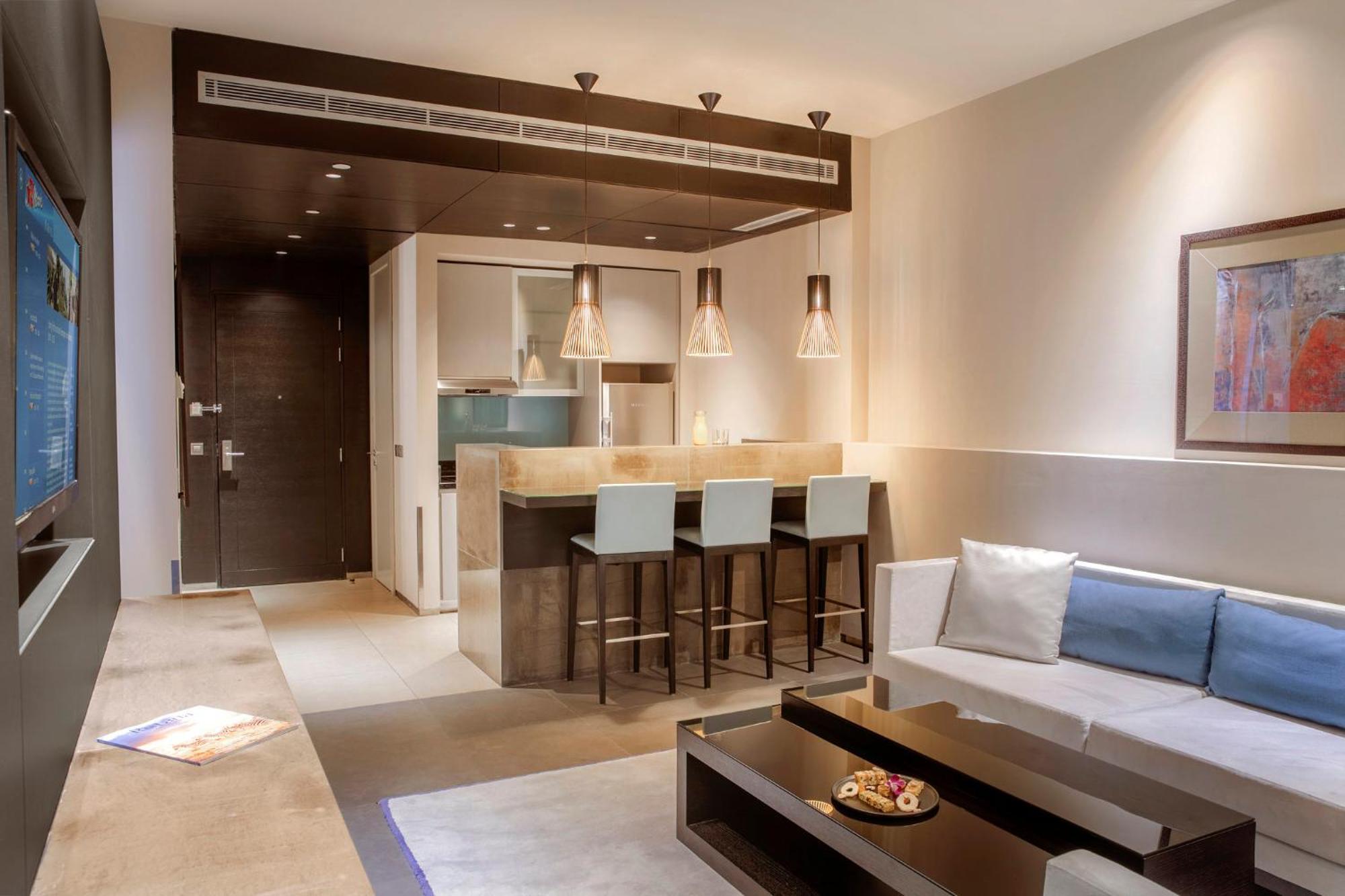 The Abdali Boulevard Hotel Amán Exterior foto A living room with a kitchenette